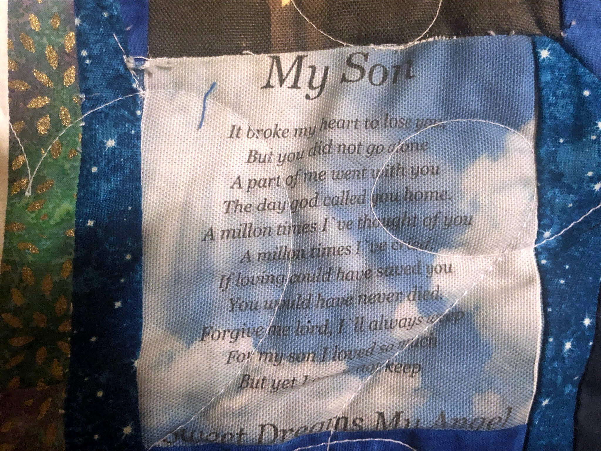 A memorial quilt label displaying a message