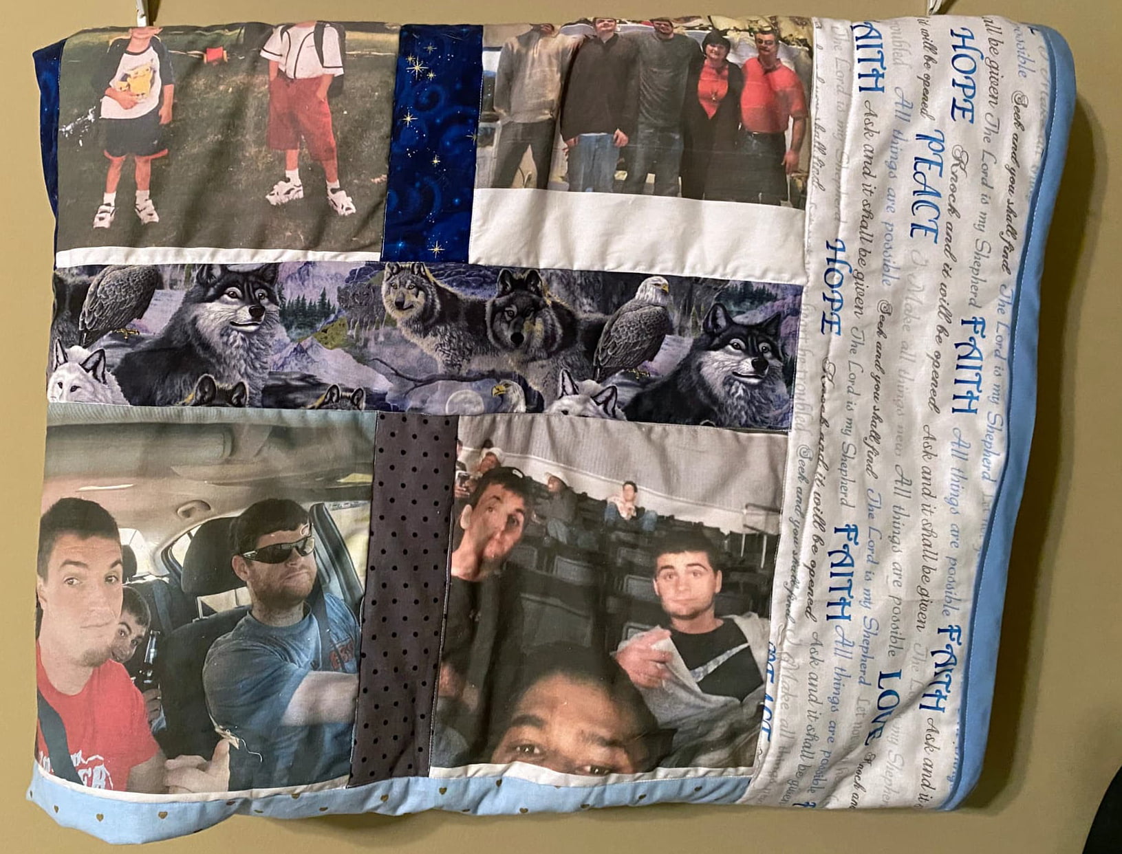 A quilt featuring many photographs and pictures of wolves