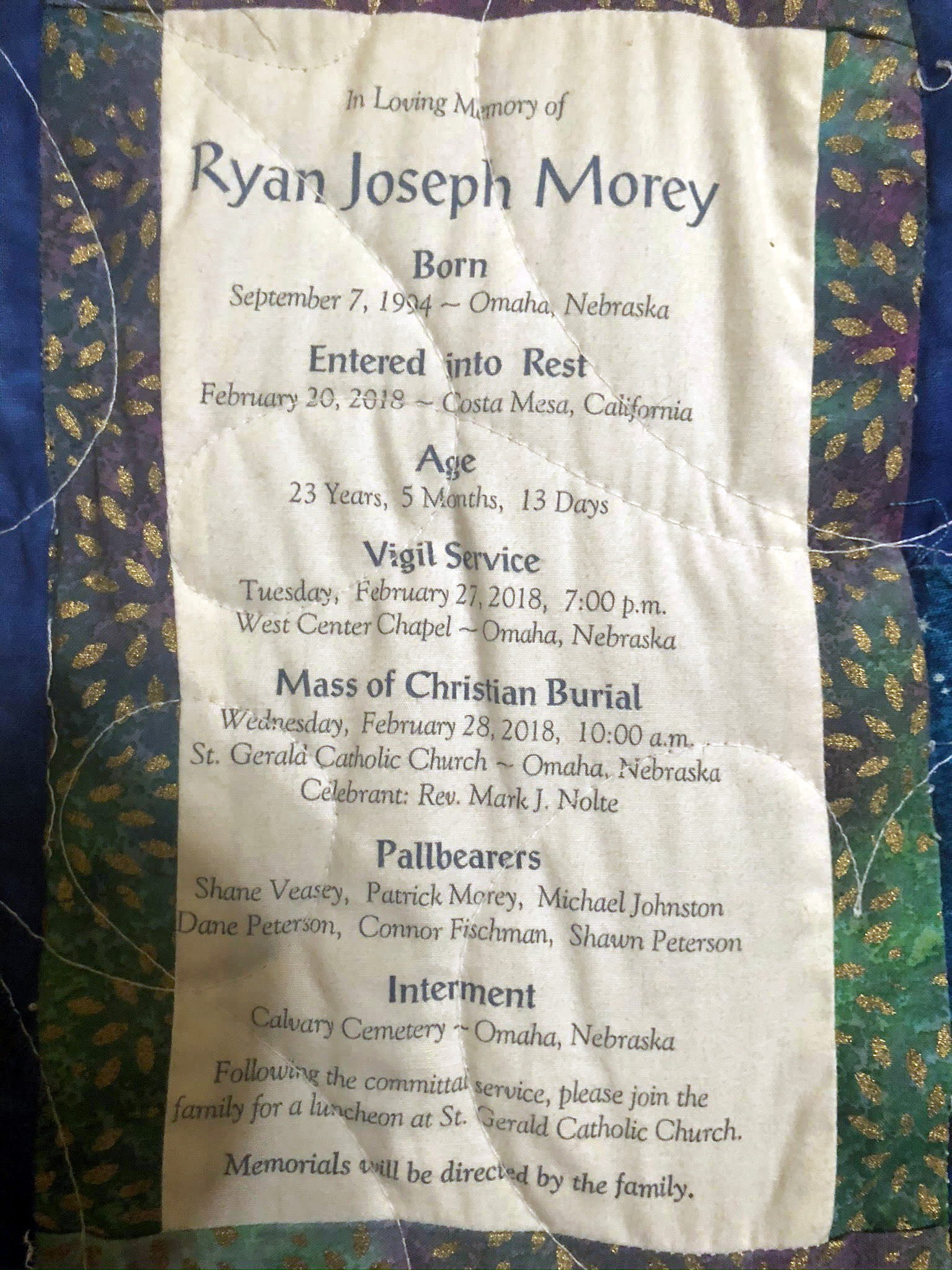 A memorial quilt label displaying the details of a service
