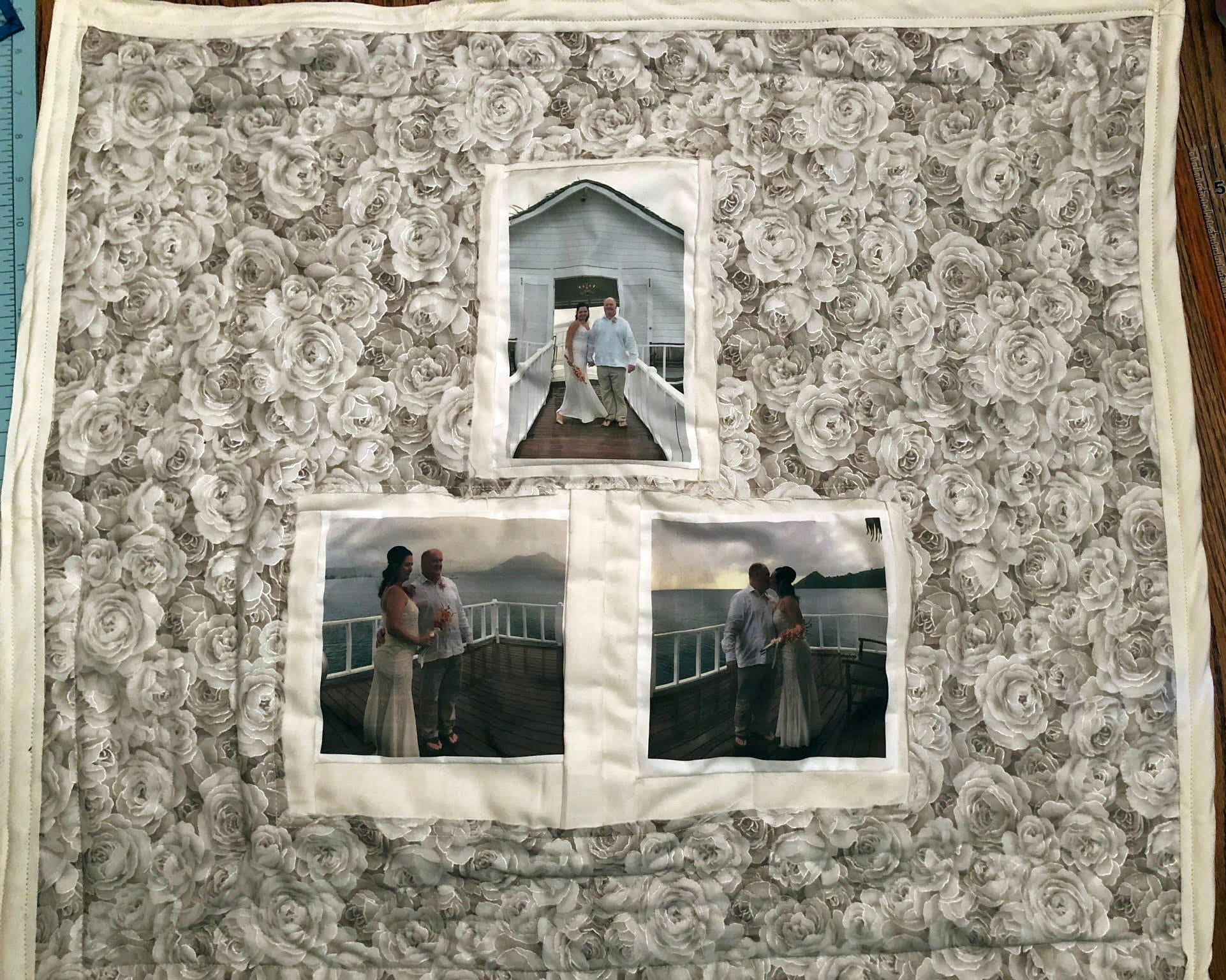 A quilt featuring photos from a wedding day